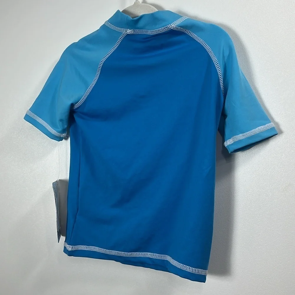 Tommy Bahama boys blue swim shirt size 3T. NWT.